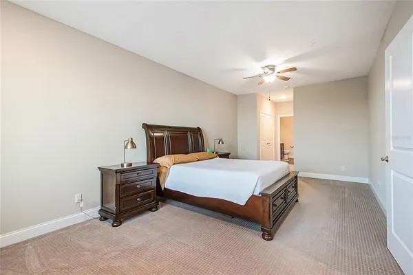 a view of a walk in closet and bathroom