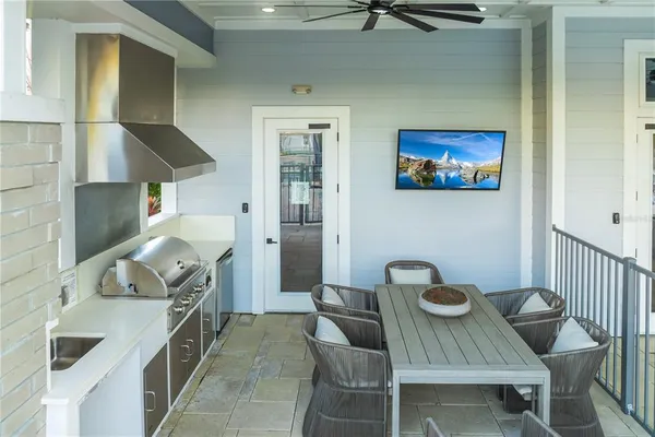 an aerial view of a house with outdoor space swimming pool and outdoor seating