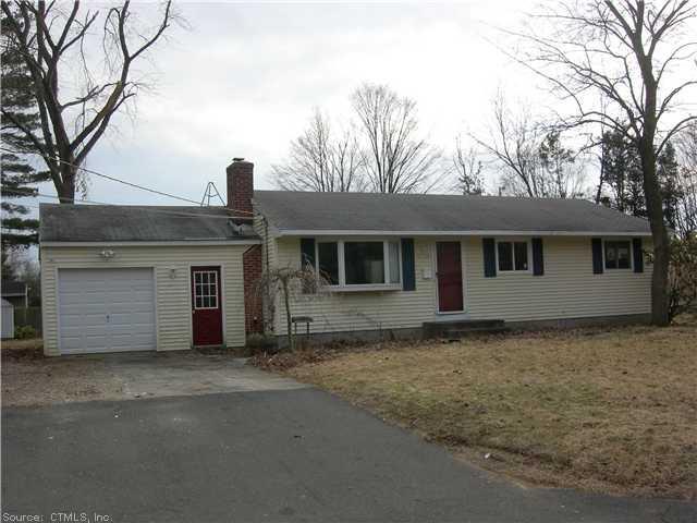 13 Carney Road Enfield, CT 06082 - Photo 1 of 1 a front view of a house with a garage