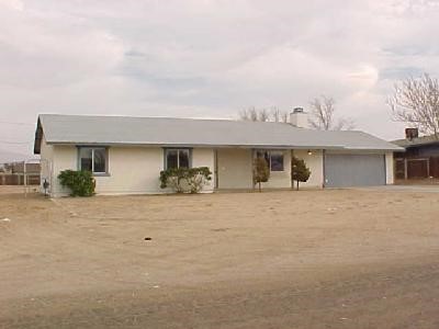12757 Redwing Road Apple Valley, CA 92308 - Photo 1 of 1 front view of a house with a yard