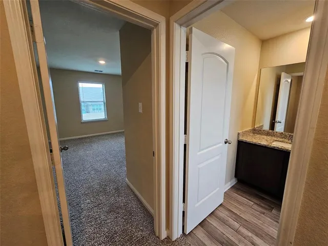 a bathroom with a tub and a shower