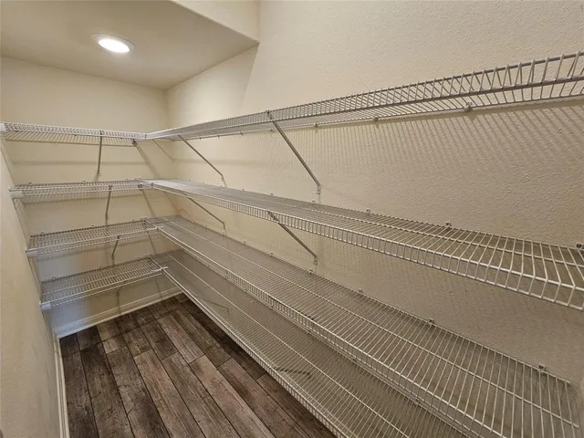 a view of a room with rack on the wall