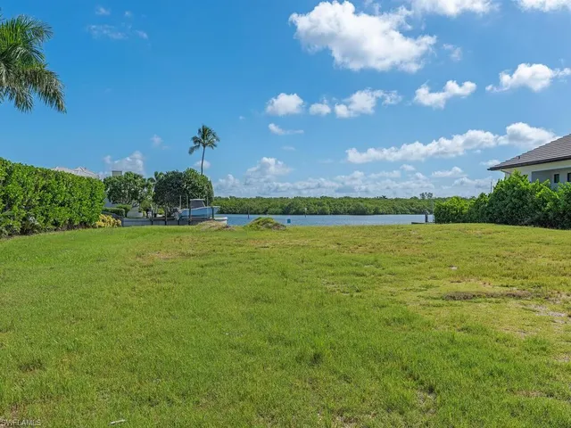 a view of a building and a yard