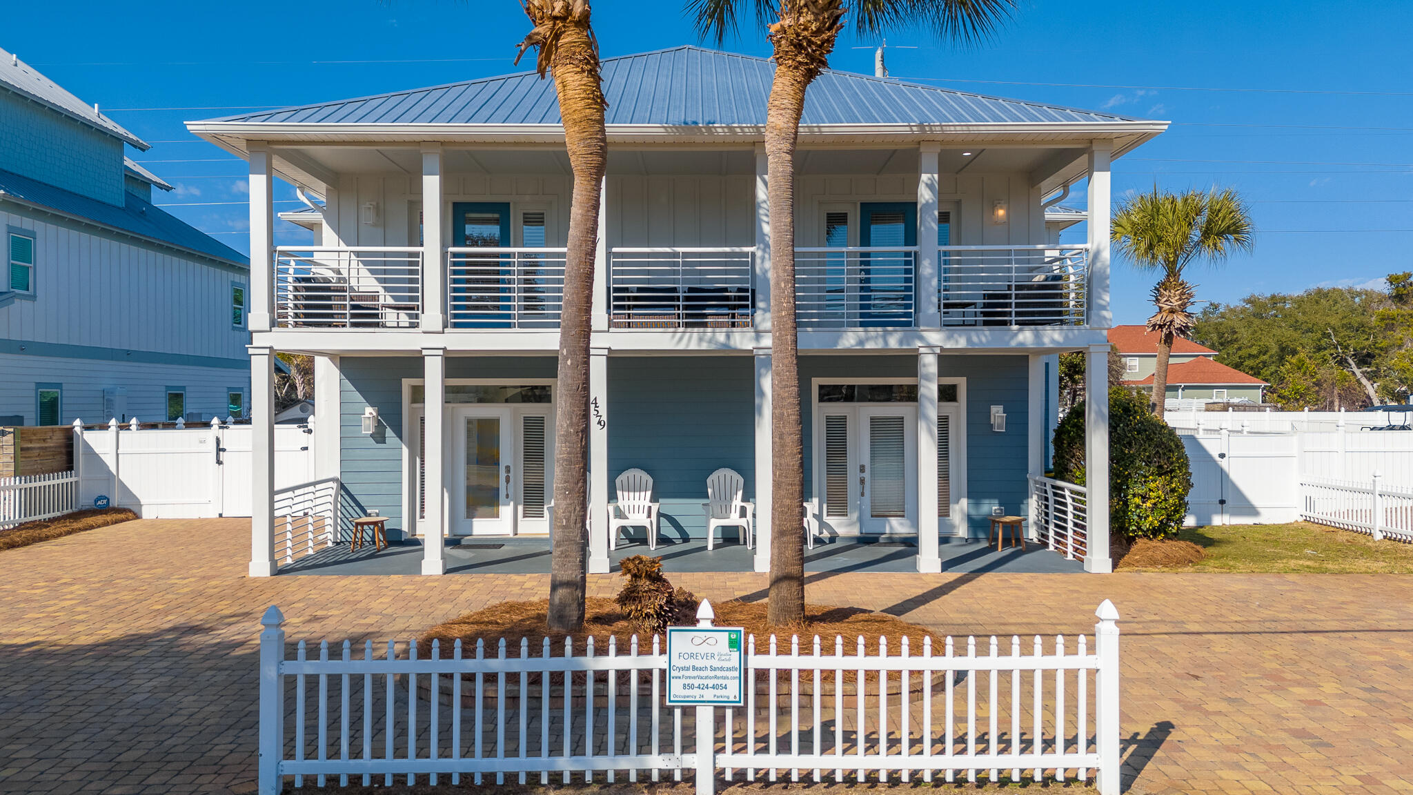 4579 Luke Avenue Destin, FL 32541 - Photo 2 of 56 a outdoor view of a house with a porch