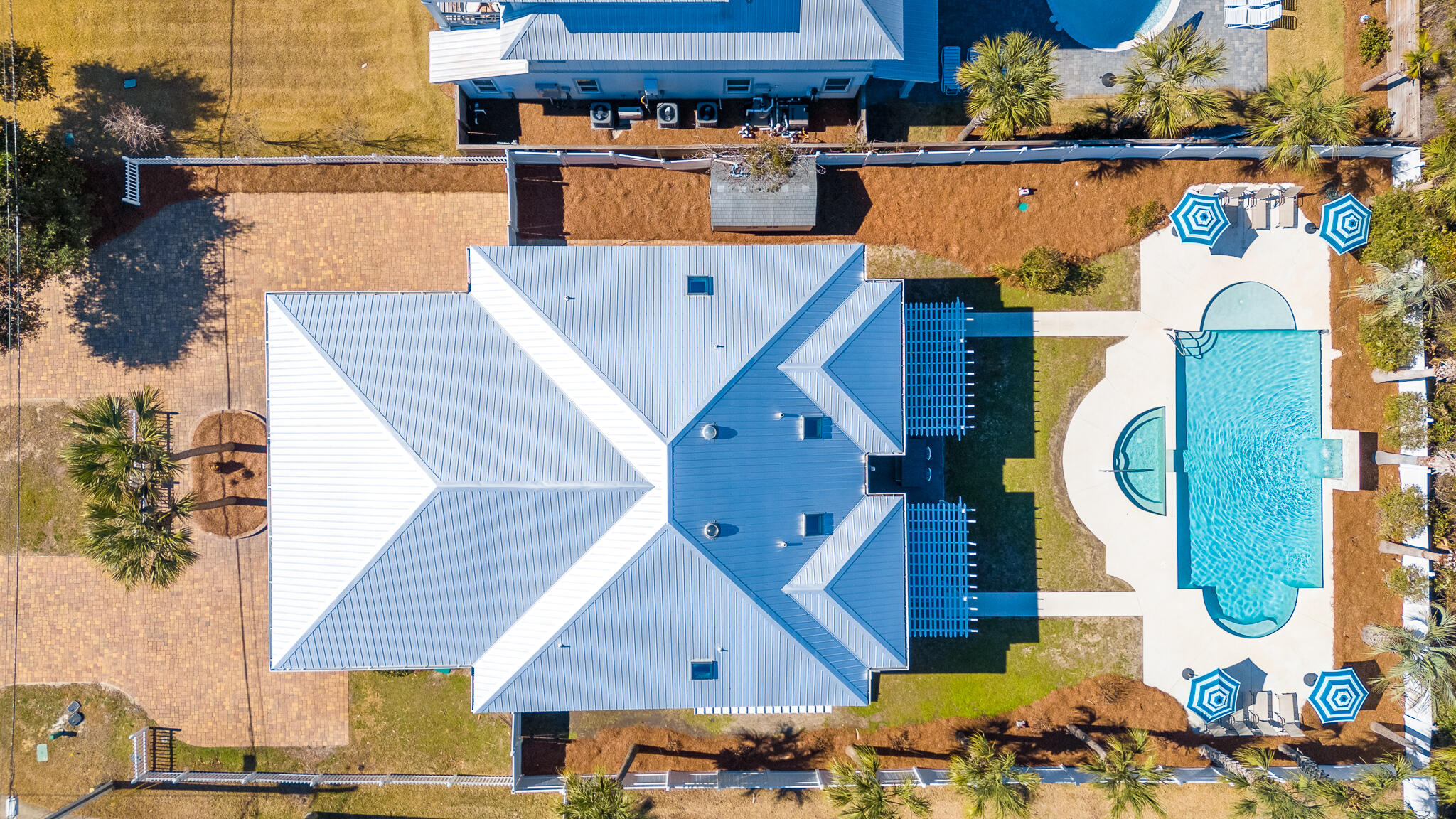 4579 Luke Avenue Destin, FL 32541 - Photo 3 of 56 an aerial view of a house with a swimming pool