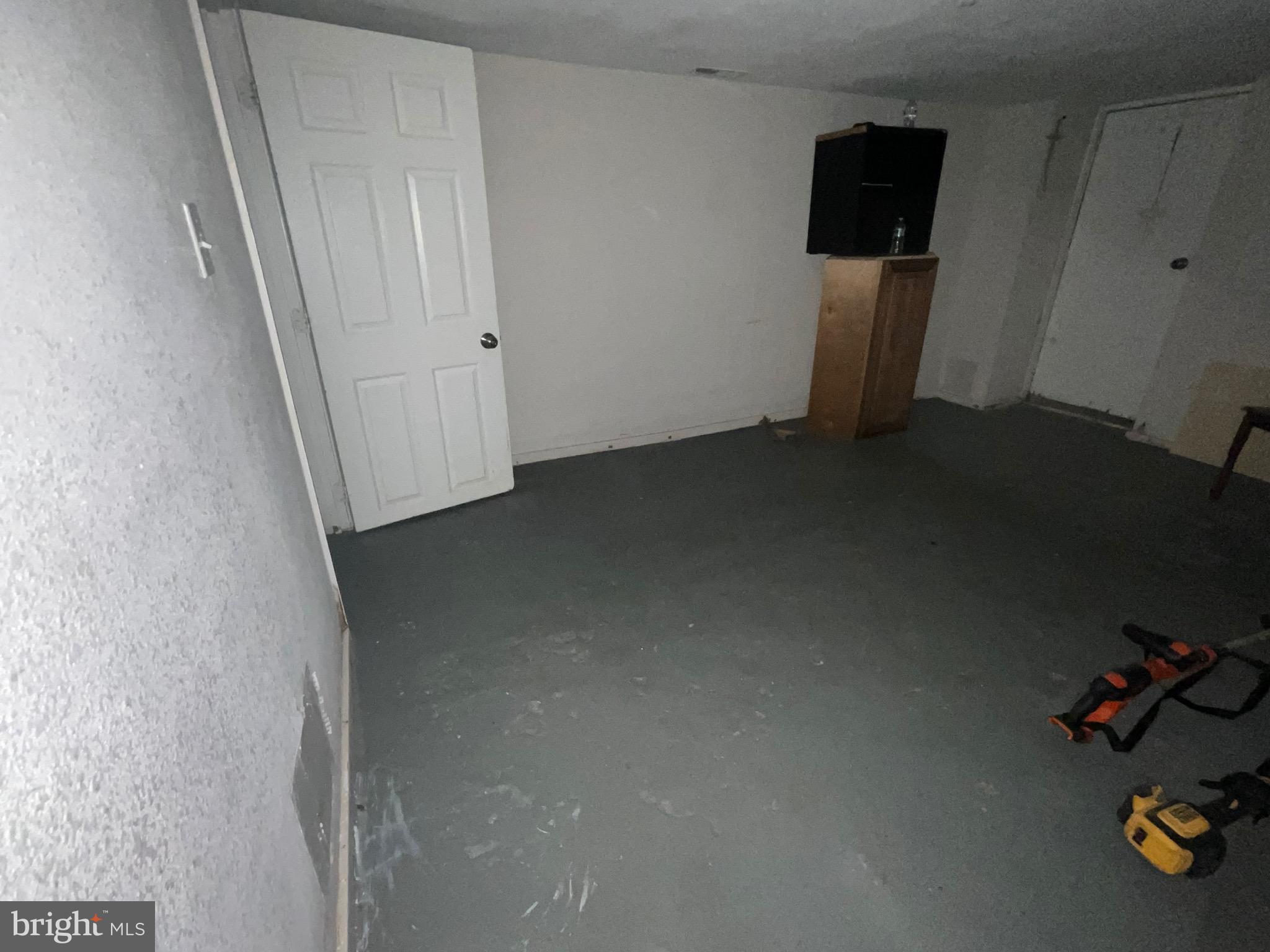 1723 East 25th Street Baltimore, MD 21213 - Photo 14 of 16 a view of a storage & utility room with a window
