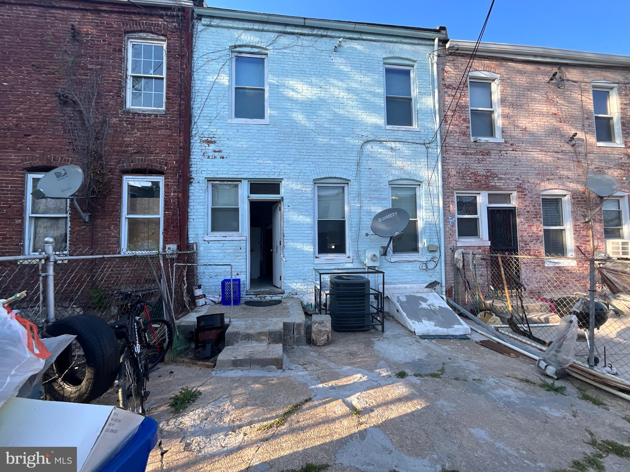 1723 East 25th Street Baltimore, MD 21213 - Photo 16 of 16 a view of a brick building with many windows