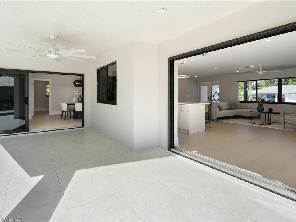 518 Cypress Way East Naples, FL 34110 - Photo 37 of 50 View of patio / terrace featuring an outdoor hangout area and ceiling fan