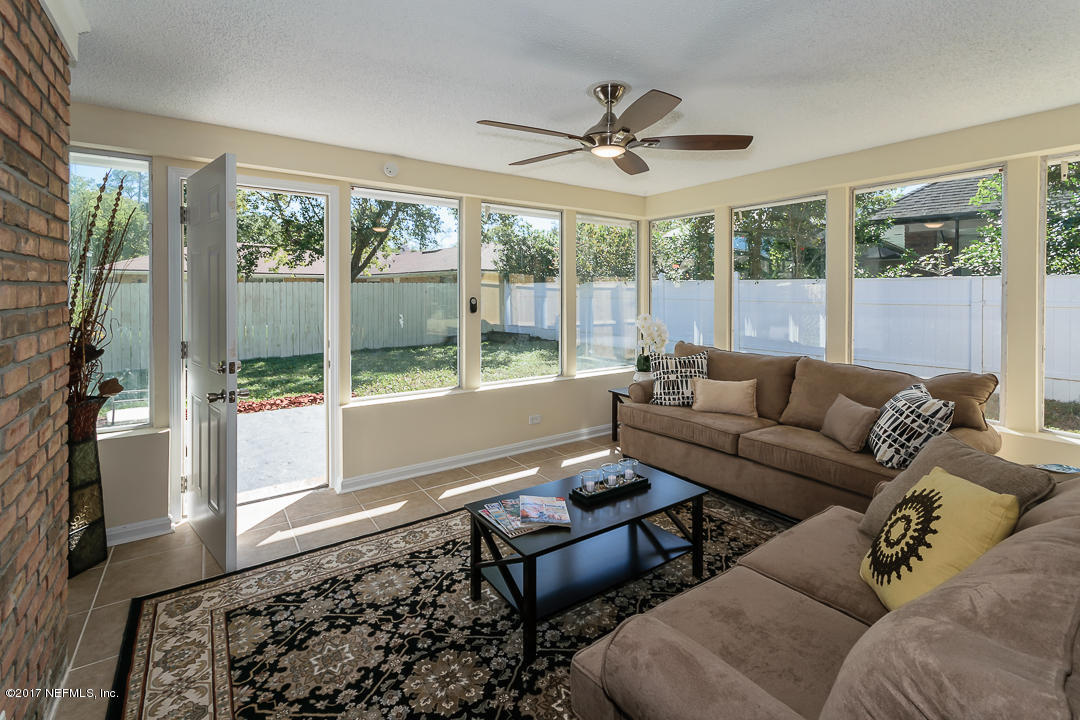 5802 Fort Sumter Road Jacksonville, FL 32210 - Photo 17 of 31 Sunroom with new windows