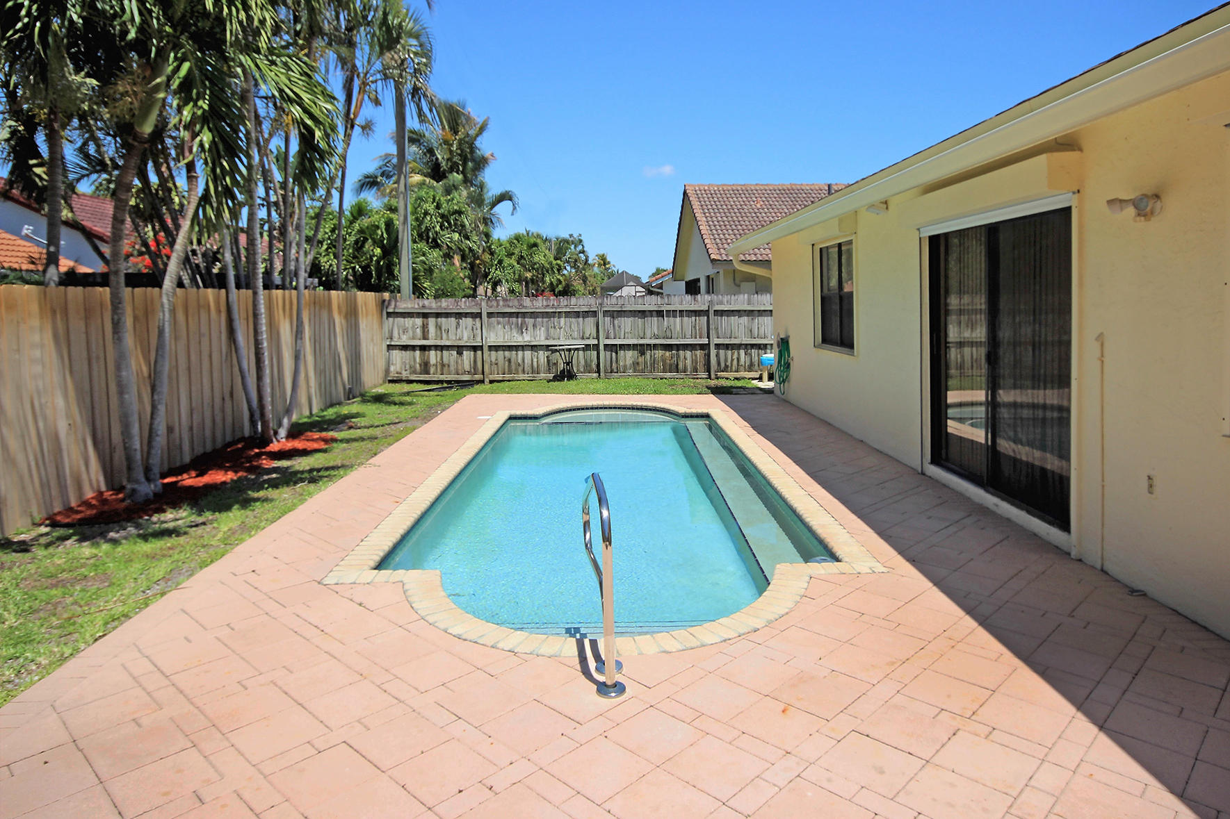 7801 West Country Club Boulevard Boca Raton, FL 33487 - Photo 32 of 40 Backyard/Pool