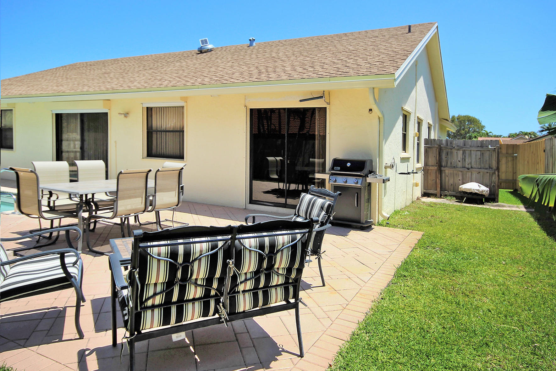 7801 West Country Club Boulevard Boca Raton, FL 33487 - Photo 36 of 40 Back & Sideyard