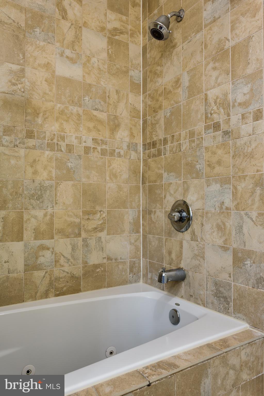 8919 Burke Lake Road Springfield, VA 22151 - Photo 14 of 30 Rich tile and stone throughout.