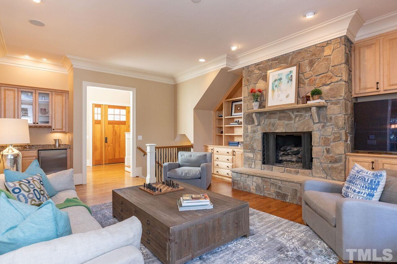 1914 Lewis Circle Raleigh, NC 27608 - Photo 11 of 55 a living room with furniture and a fireplace