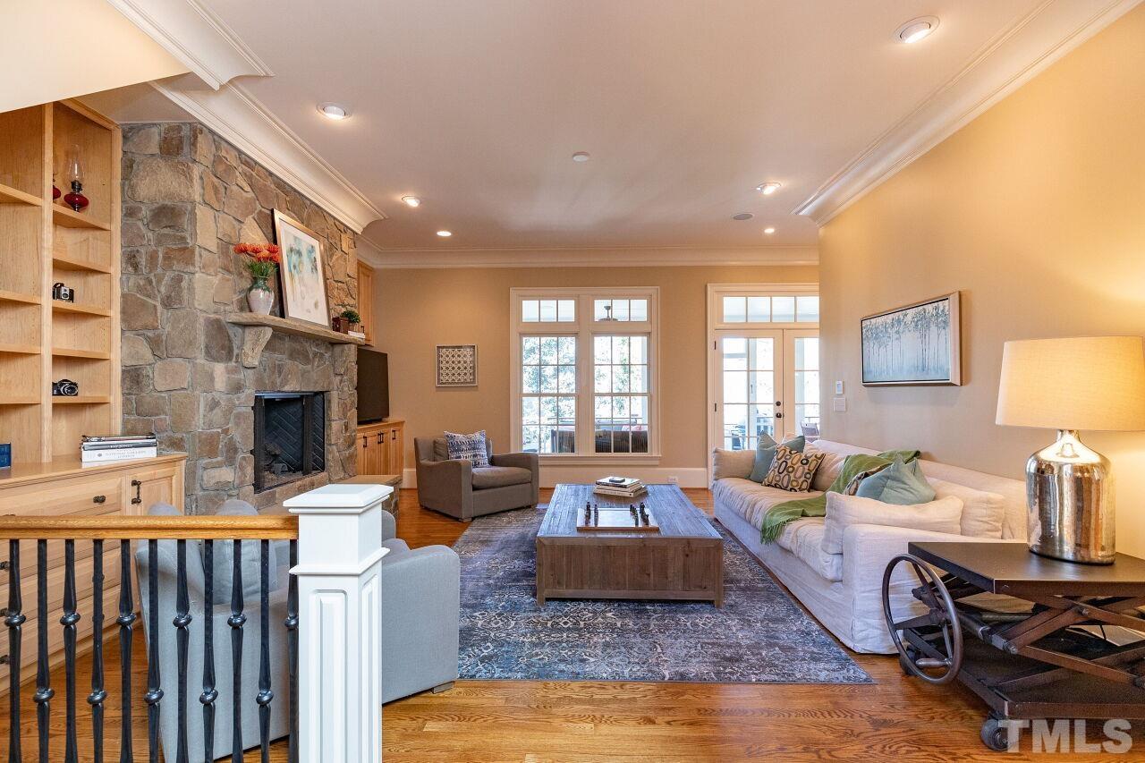 1914 Lewis Circle Raleigh, NC 27608 - Photo 2 of 55 a living room with furniture window and a fireplace