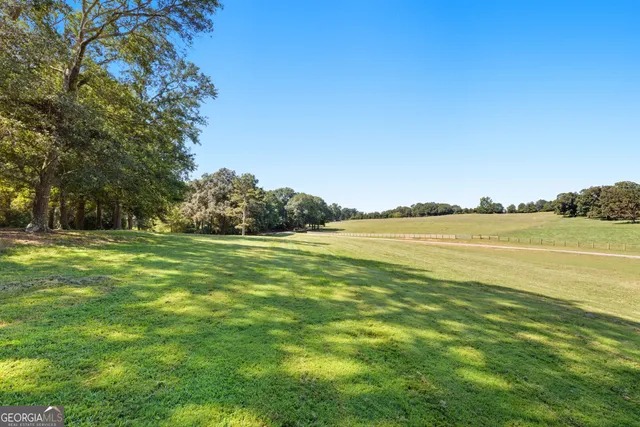 a fire hydrant in the middle of a field