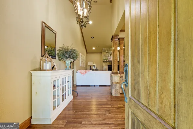 a bathroom with a sink a mirror and shower view