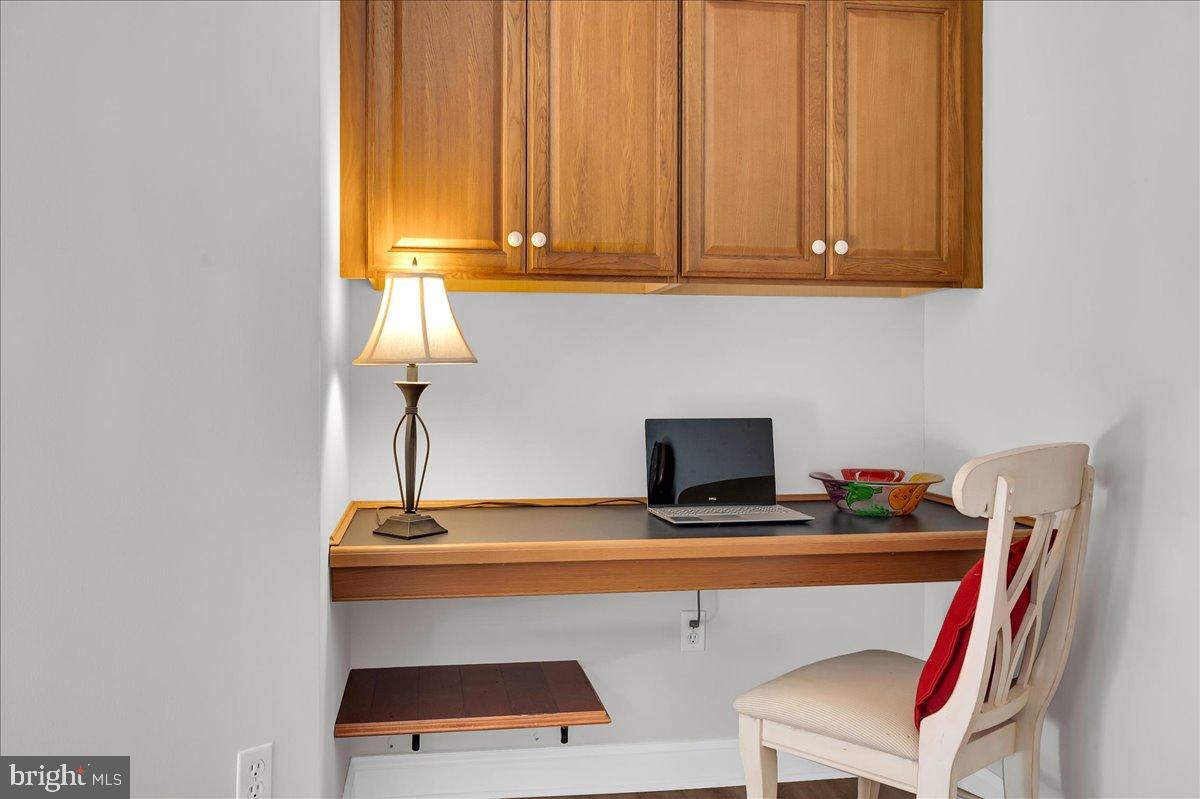 3000 Fountainview Circle, Unit 202 Newark, DE 19713 - Photo 8 of 36 Built in desk and cabinets