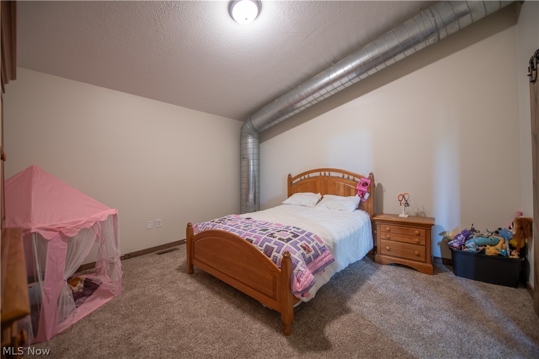 9918 Ridge Road Southeast Uhrichsville, OH 44683 - Photo 27 of 42 Second Floor Bedroom
