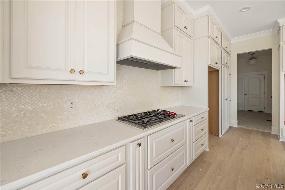10716 River Fall Path Glen Allen, VA 23059 - Photo 4 of 7 a kitchen with white cabinets and appliances