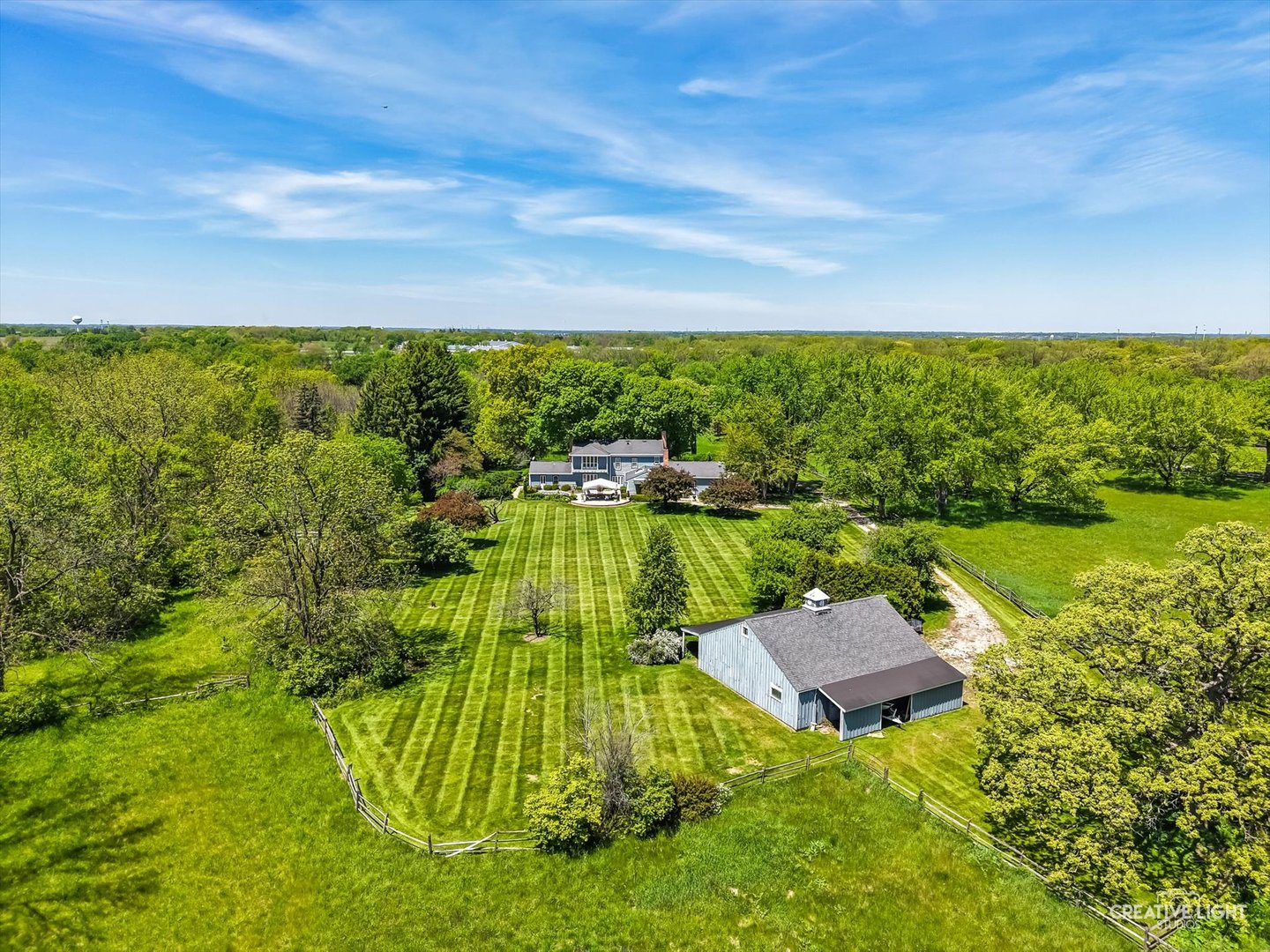 33W451 Surrey Road Wayne, IL 60184 - Photo 6 of 41 a view of a lake with a garden