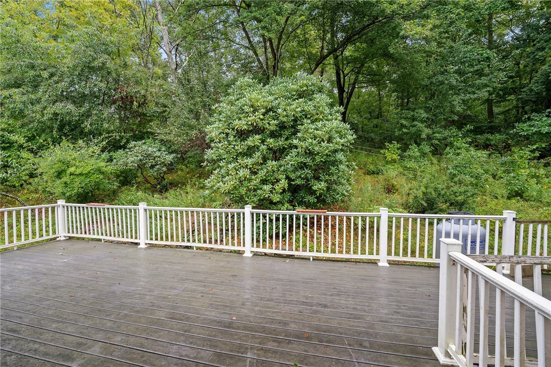 34 Maxson Hill Road Hopkinton, RI 02804 - Photo 23 of 36 Composite decking off the kitchen