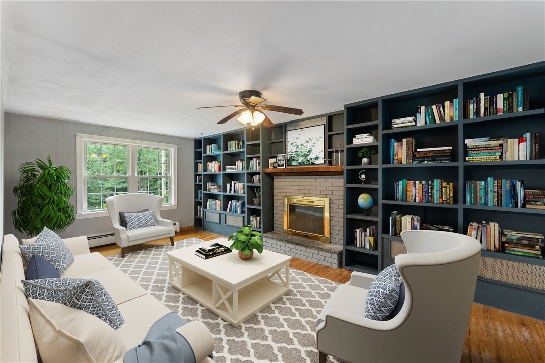 34 Maxson Hill Road Hopkinton, RI 02804 - Photo 6 of 36 Spacious den to enjoy a wood burning fire and some family time