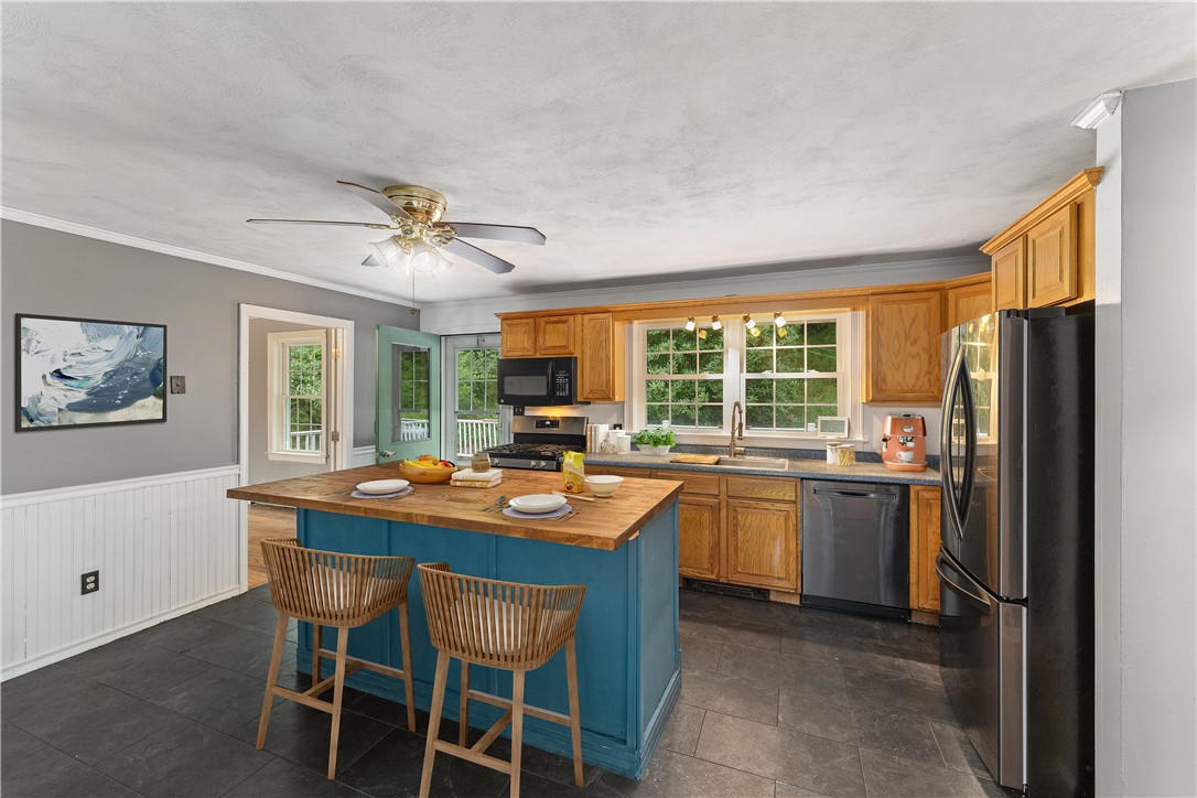 34 Maxson Hill Road Hopkinton, RI 02804 - Photo 9 of 36 Large eat in kitchen, lots of storage, including walk in food pantry! Newer stainless-steel appliances