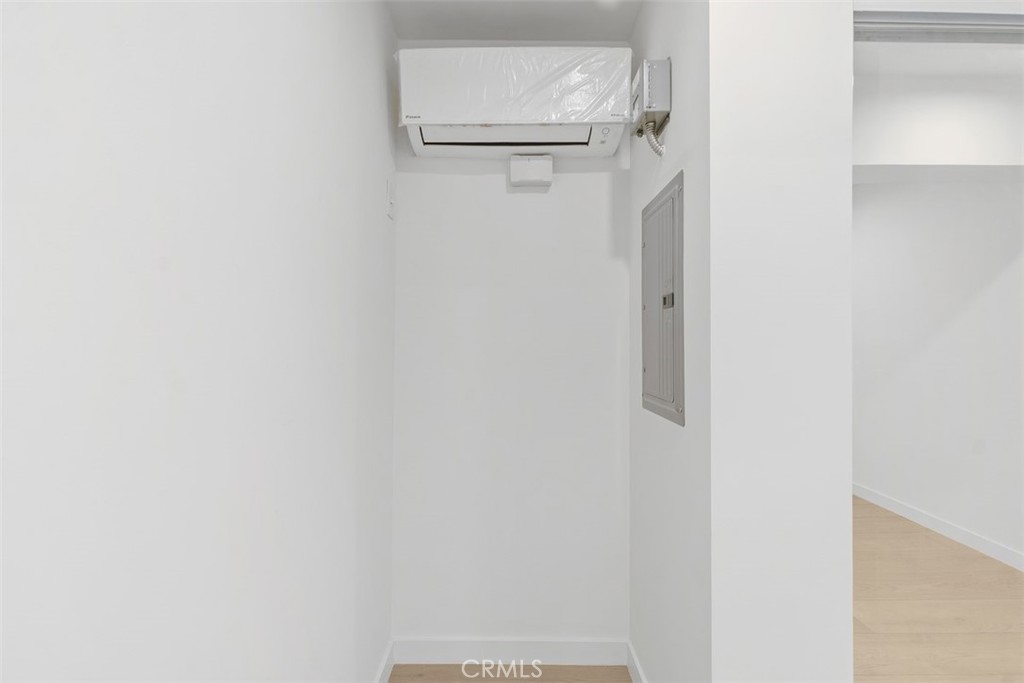 3926 Acacia Street Irvine, CA 92606 - Photo 16 of 32 a bathroom with a glass shower door