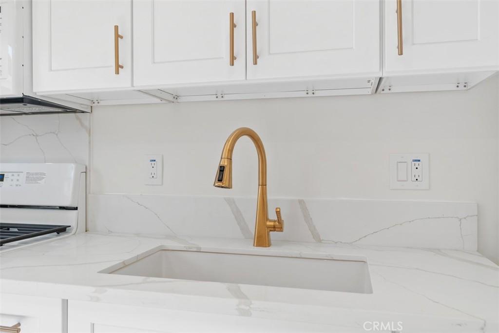 3926 Acacia Street Irvine, CA 92606 - Photo 21 of 32 a close view of a sink and a window