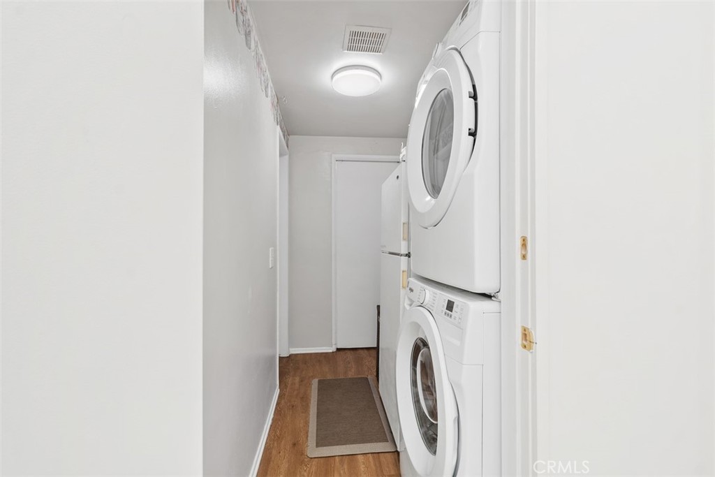 3926 Acacia Street Irvine, CA 92606 - Photo 23 of 32 a utility room with dryer and washer