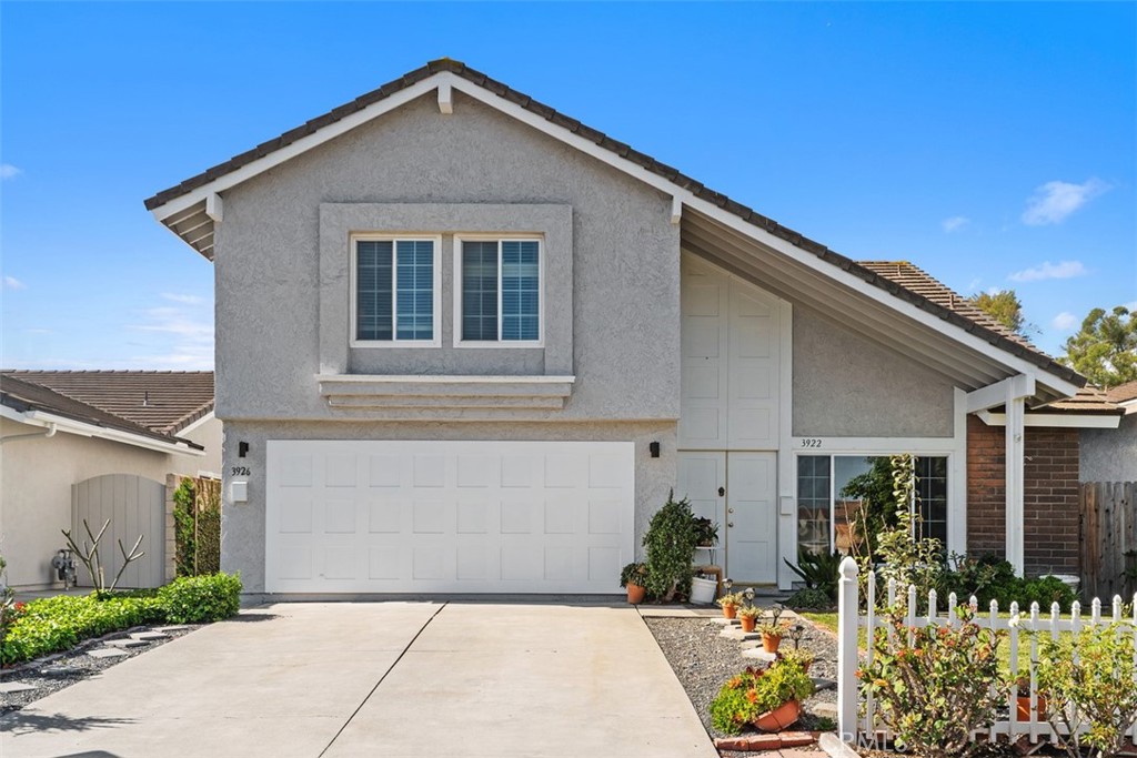 3926 Acacia Street Irvine, CA 92606 - Photo 24 of 32 a front view of a house with a yard