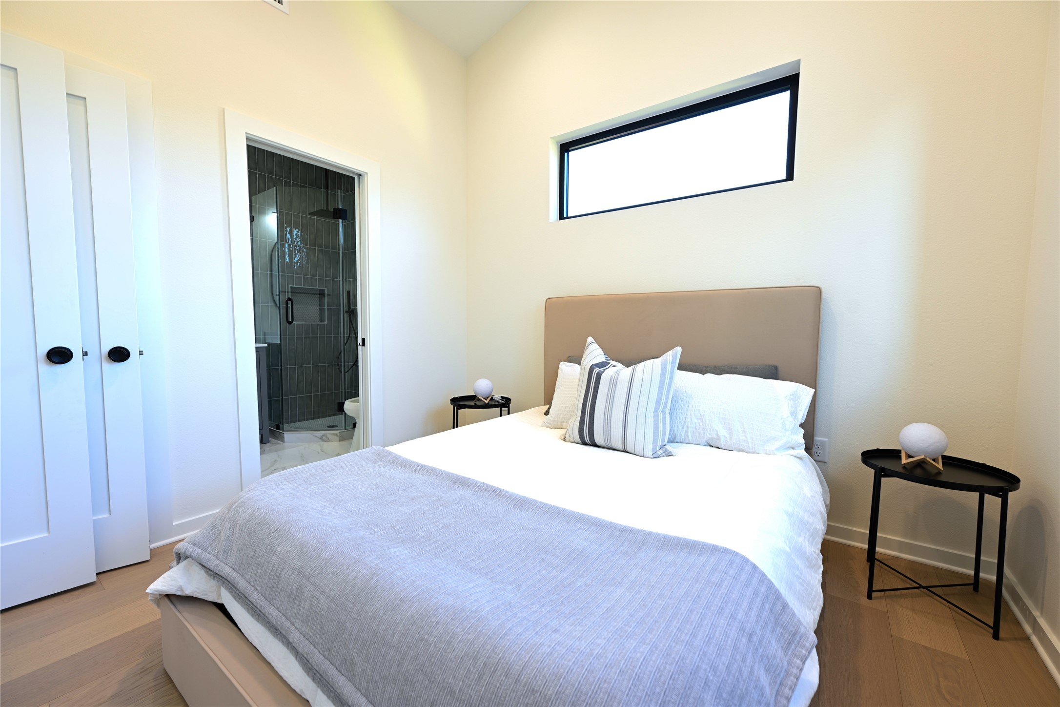 4410 Glomar Avenue, Unit 2 Austin, TX 78721 - Photo 20 of 24 The 3rd en-suite bedroom