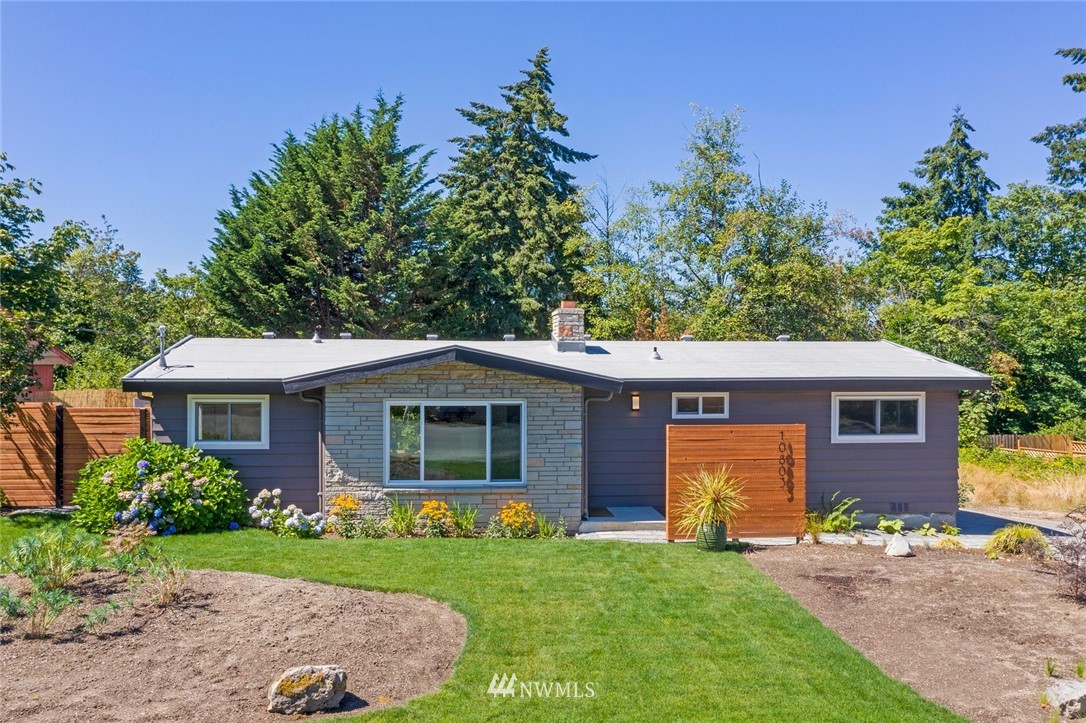 10803 Rustic Road South Seattle, WA 98178 - Photo 1 of 38 a front view of house with yard and green space