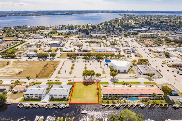 an aerial view of residential building and parking space