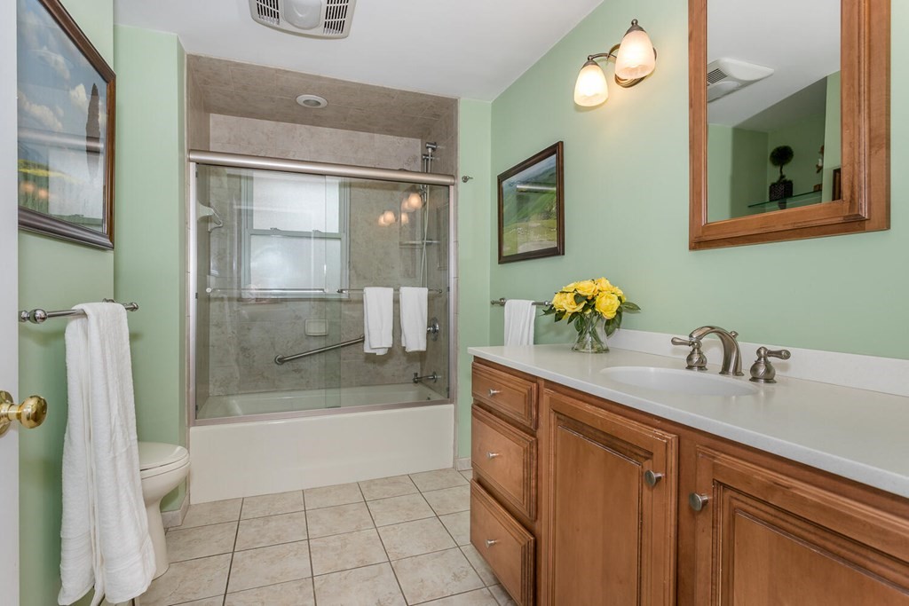 14 Kings Road Canton, MA 02021 - Photo 19 of 23 a bathroom with a sink toilet and shower