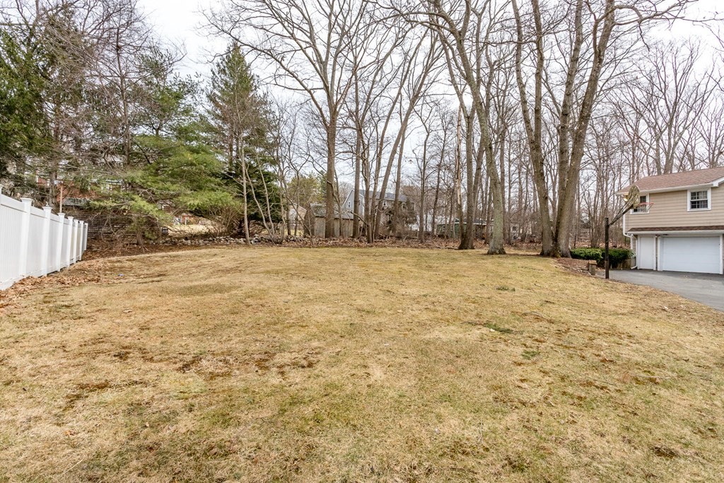 14 Kings Road Canton, MA 02021 - Photo 23 of 23 a view of a yard with a trees