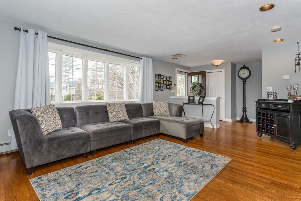 14 Kings Road Canton, MA 02021 - Photo 4 of 23 a living room with furniture and a large window