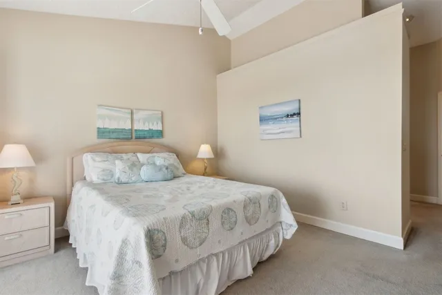 a spacious bathroom with a double vanity sink a mirror and a shower