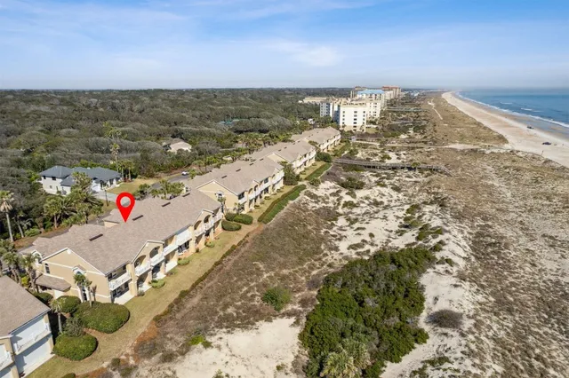 a sign that is on a brick wall