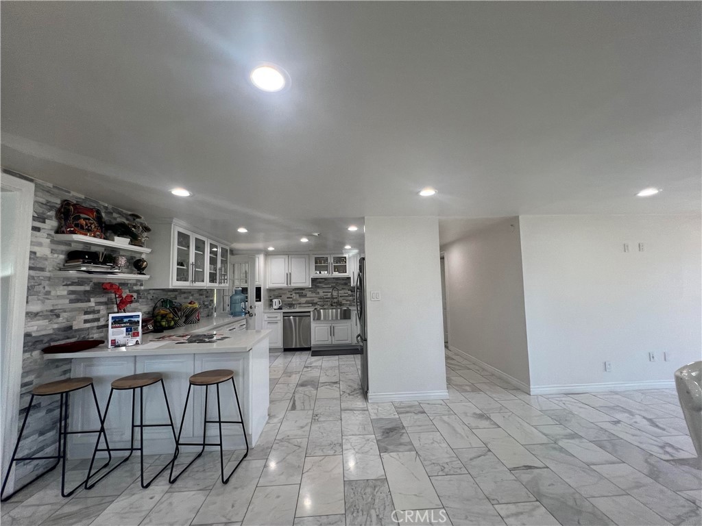 19449 Lurelane Street Rialto, CA 92376 - Photo 7 of 15 kitchen & halway
