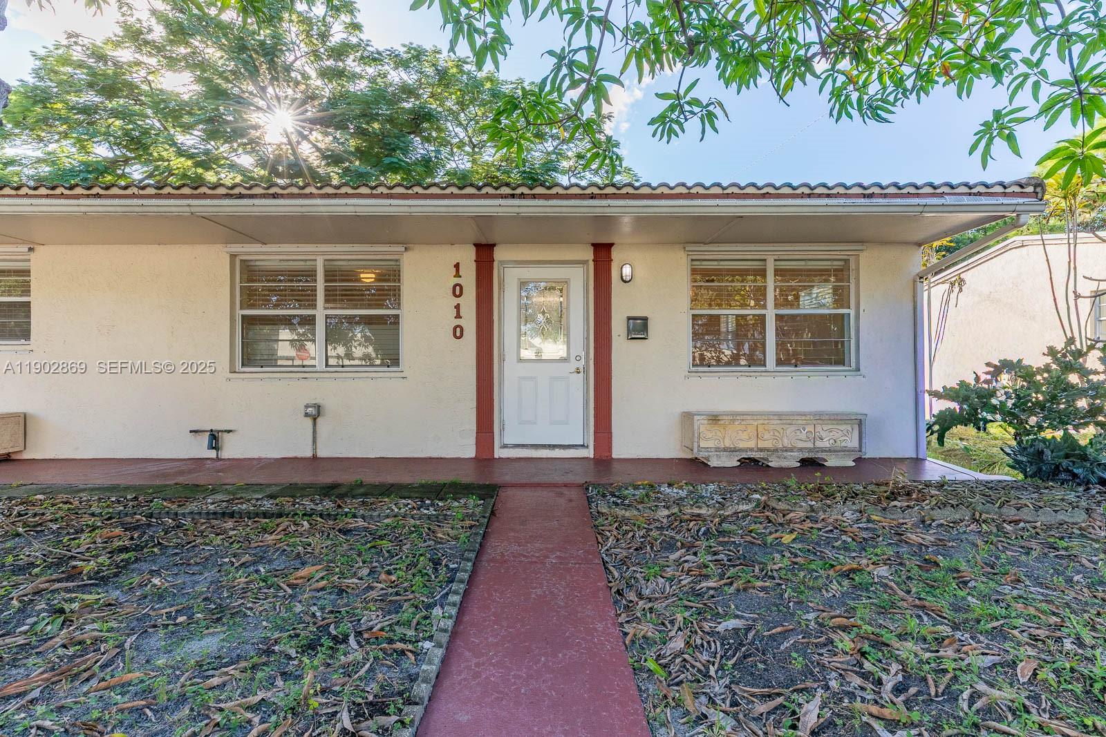 1010 North 69th Way Hollywood, FL 33024 - Photo 2 of 23 a front view of a house