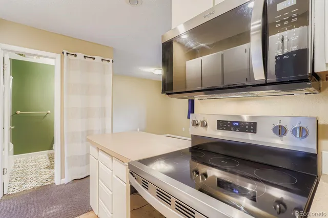 a view of stove top oven and microwave