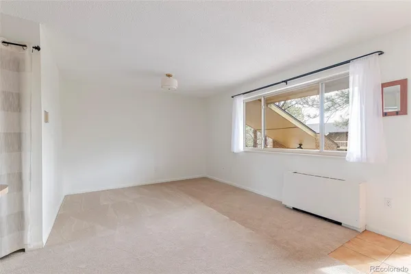 a view of a room with an empty space