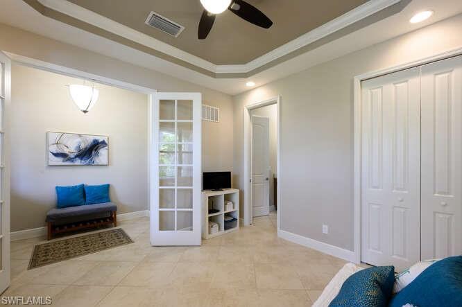 1641 Serrano Circle Naples, FL 34105 - Photo 20 of 50 a view of work space with furniture and windows