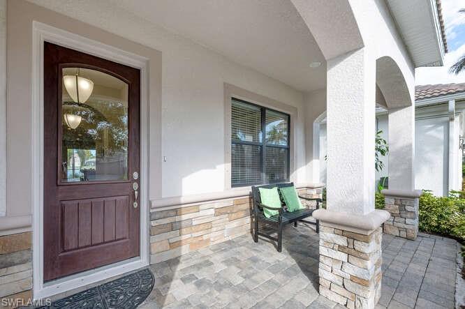 1641 Serrano Circle Naples, FL 34105 - Photo 3 of 50 a view of front door of house