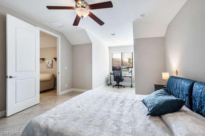 1641 Serrano Circle Naples, FL 34105 - Photo 40 of 50 a bedroom with furniture and a window