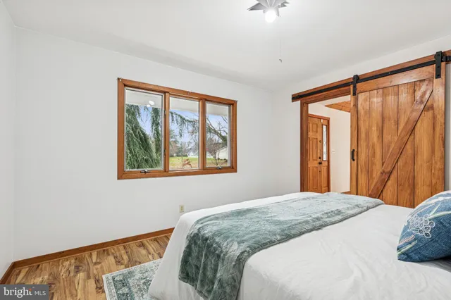 a balcony with table and chairs