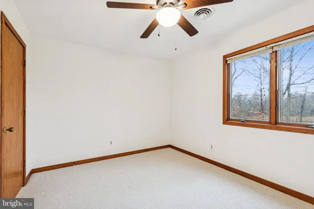 a view of balcony with outdoor seating and wooden floor