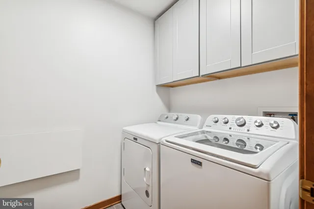 a view of a swimming pool with a yard