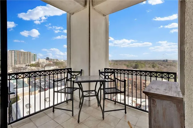 a view of a balcony with an ocean view